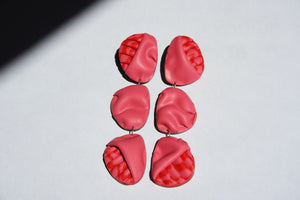 RANGE (dark pink/red)